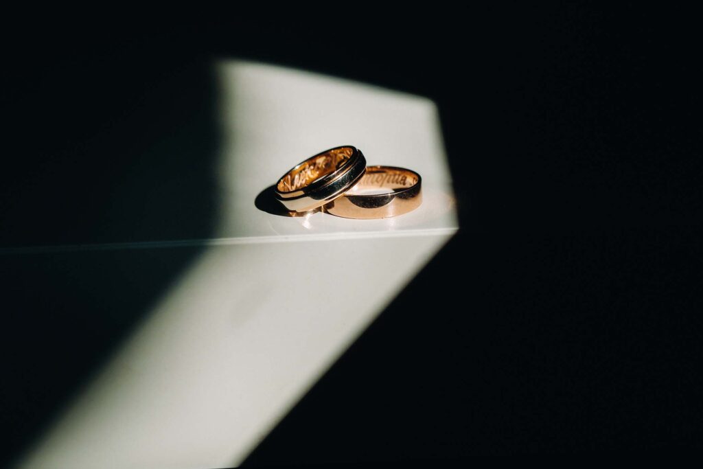 close-up-of-two-gold-wedding-rings-for-a-wedding-52PRPJM.jpg